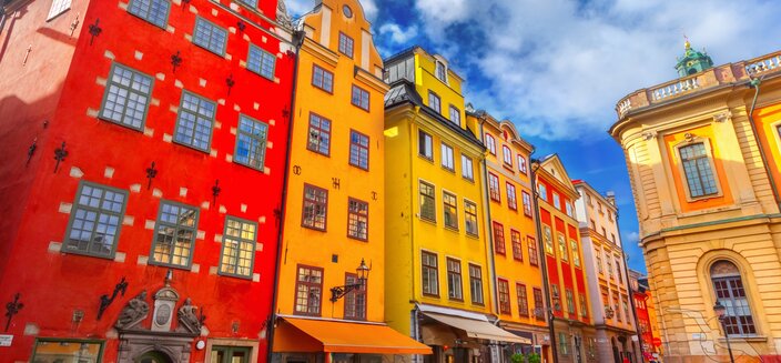 Deutschland -farbenfrohe Häuser in Stockholm, Schweden